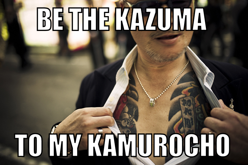 Yakuza street fighter aggressively showing off his tattoo in Kabukicho, Shinjuku, Tokyo - 2010